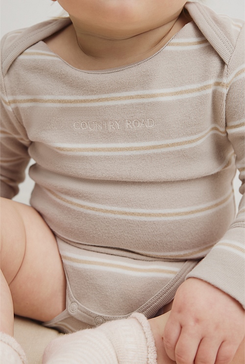 Organically Grown Cotton Stripe Logo Long Sleeve Bodysuit Organically Grown Cotton Stripe Logo Long Sleeve Bodysuit