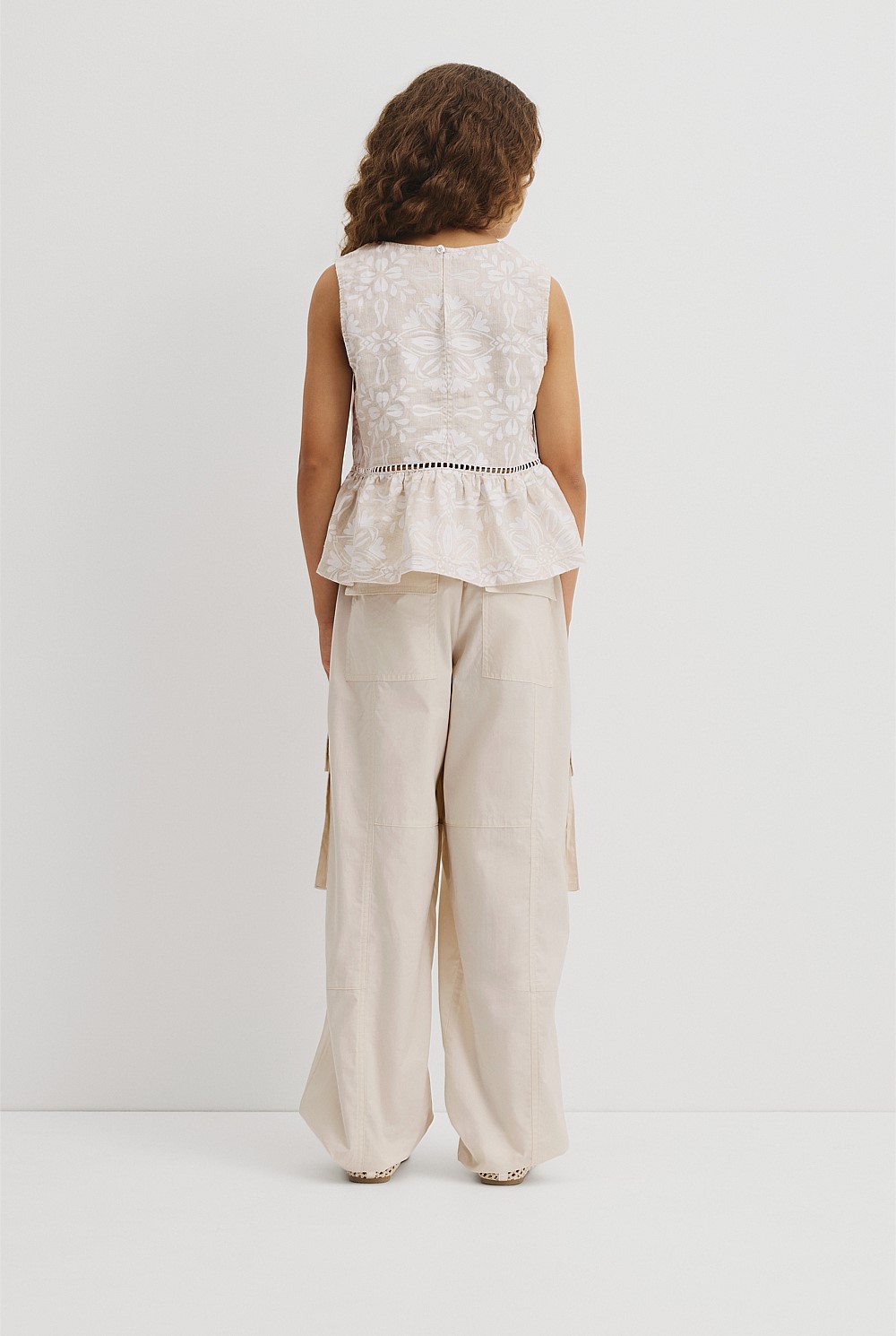 Teen Sleeveless Peplum Top